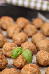 Meatballs on baking sheet