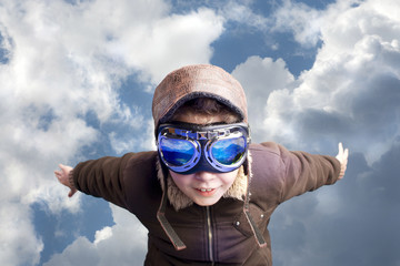 Boy flying, daydreaming he´s a pilot