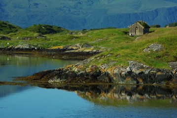 Fototapeta na wymiar Fisherman's hut on an island