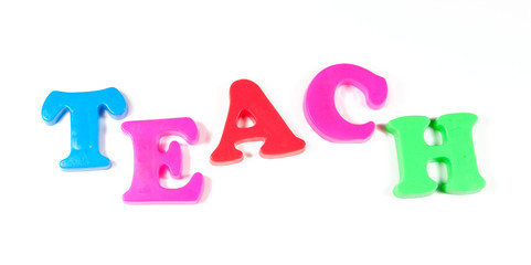 teach written in fridge magnets