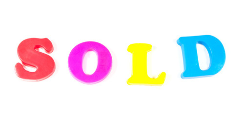 sold written in fridge magnets