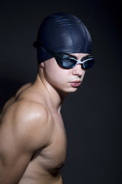 Portrait of Man Wearing Swimming Cap and Goggles