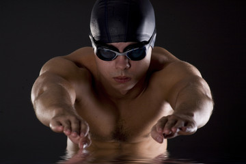Portrait of Man Wearing Swimming Cap and Goggles