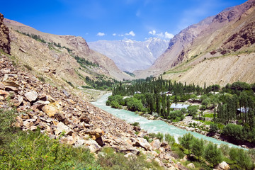 Mountain morraine river under blue sky