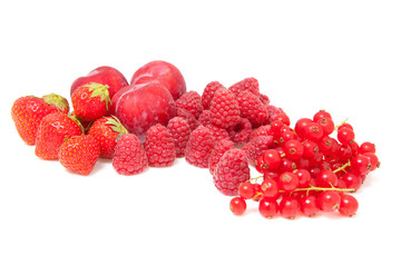 fresh red fruits over white background