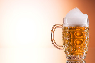 Beer glasses against the colorful gradient background