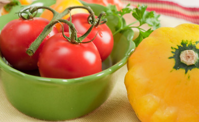 Fresh tomatoes and squash close-up