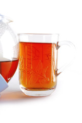tea in glass and kettle