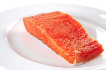 fresh smoked salmon on white plate