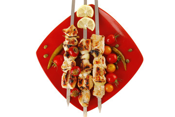 roast shish kebab on red