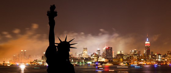 The Statue of Liberty and New York Skyline