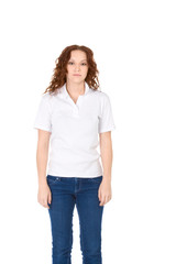Young redhead woman in white polo shirt and jeans