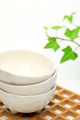 white tableware and ivy