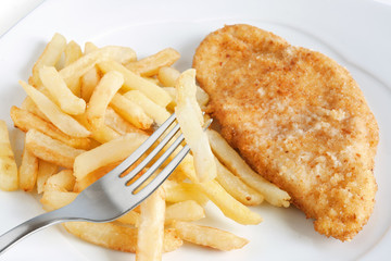 fried potatoes and chicken