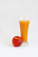 Glass of juice and peach
