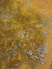 very rusty yellow orange metal steel plate with lots of scratche