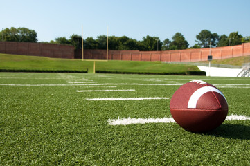 Closeup of American Football  on Field