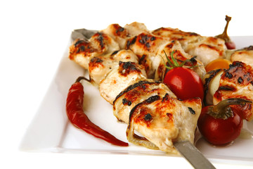 roast chicken shish kebab on white