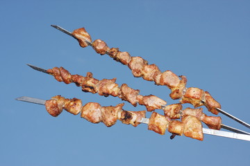 shashlick on a background blue sky