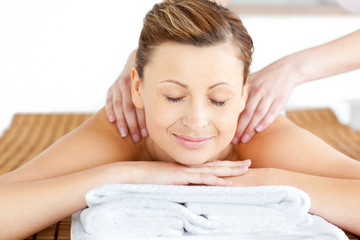 Obraz premium Resting young woman having a back massage