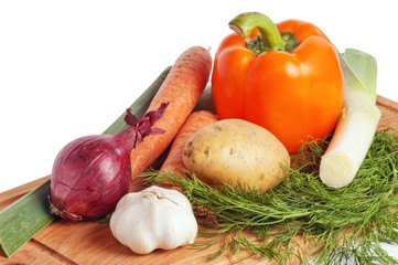 vegetables on a wooden kitchen board