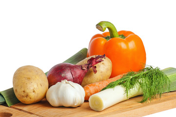 vegetables on a wooden kitchen board