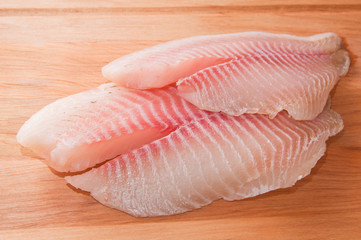 Fillet of fish on a kitchen board