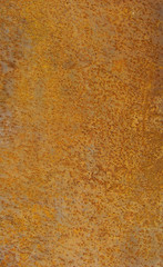 orange brown yellow speckled rusty steel metal plate of iron