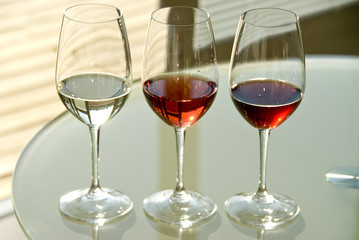 glasses of red and white wine