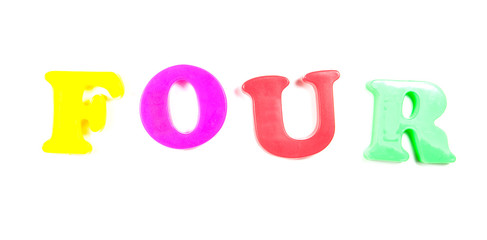 four, written in fridge magnets