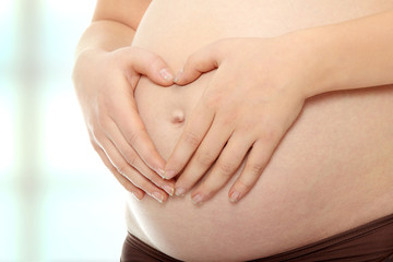 Fototapeta na wymiar Belly of a pregnant woman