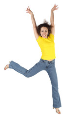 young attractive woman in yellow shirt and jeans jumping