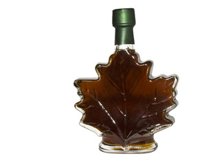 Maple syrup in glass bottle