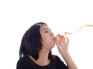 girl blowing paper streamers isolated on white background