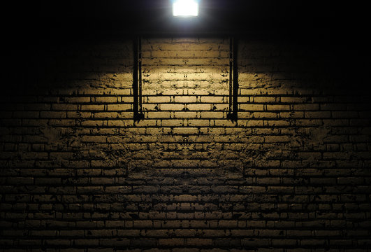 Brick wall with spotlight