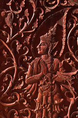 Fototapeta na wymiar Angel in native Thai style wood carving