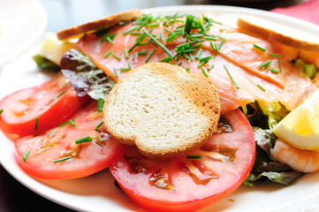 Fresh Salmon with lemon and bread