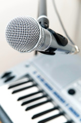 microphone and piano keyboard close-up