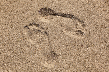 Fototapeta na wymiar footprints at the beach