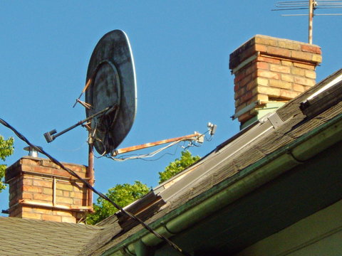 Two chimneys and parabolic antenna