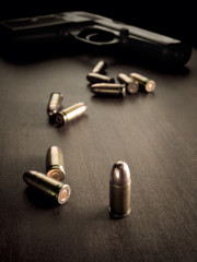 bullets and handgun