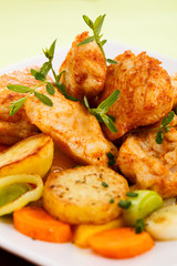 Roasted chicken meat with vegetable salad