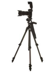 Tripod and professional DSLR camera with external flash