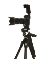 Tripod and professional DSLR camera with external flash