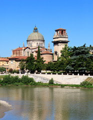 Fototapeta na wymiar Old church over river Adige