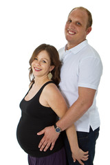 Fototapeta premium Young couple standing in studio setting isolated over white back