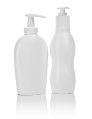 two white cosmetical bottles isolated