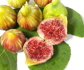 Ripe juicy figs isolated on white background