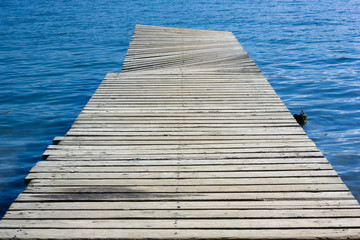Fototapeta premium footbridge on the blue water in a sunny day 3