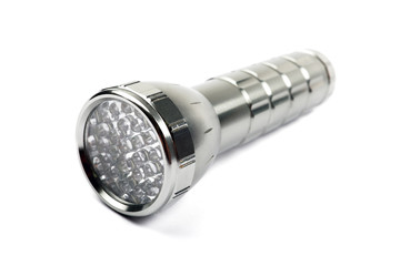 Modern LED torch isolated on white background.